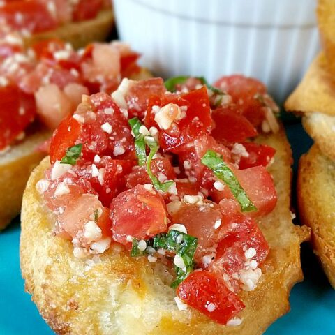 Bruschetta with Tomato and Asiago Parmesan Cheese