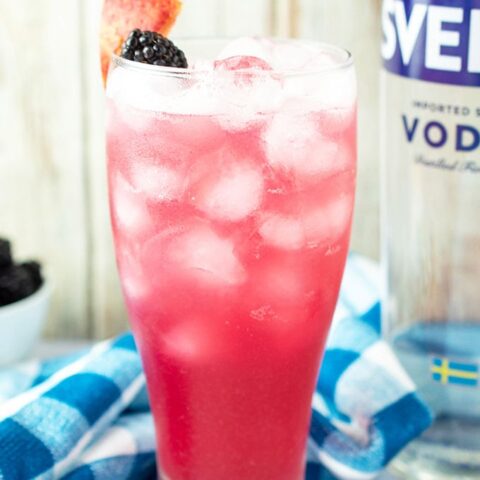 Image for Peach and blackberry vodka cocktail