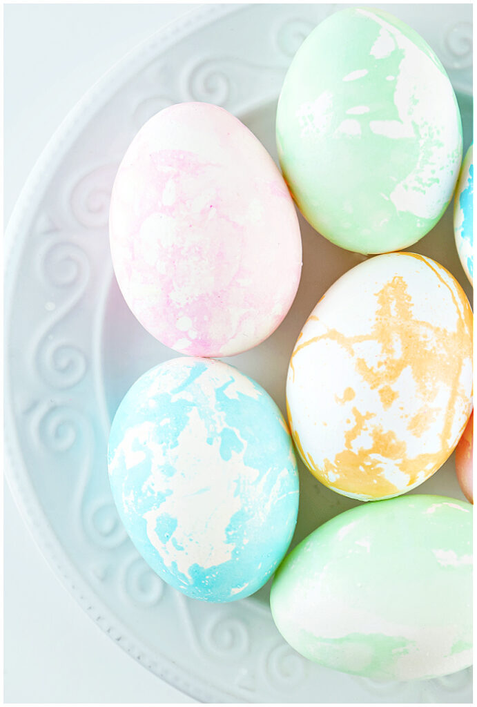 Marbled Easter eggs on white plate
