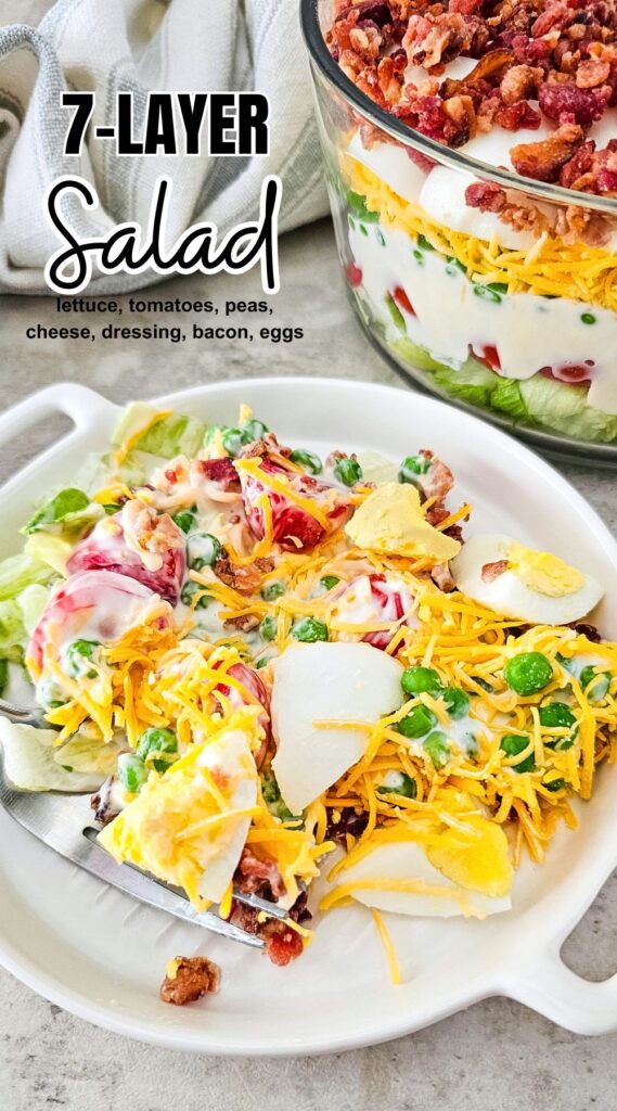 A delicious 7-layer salad perfect for any occasion. This vibrant and visually stunning dish features layers of fresh vegetables, cheese, crispy bacon, eggs, and a creamy dressing. It's easy to make and will impress your guests with its beautiful presentation. Try this recipe and elevate your salad game!